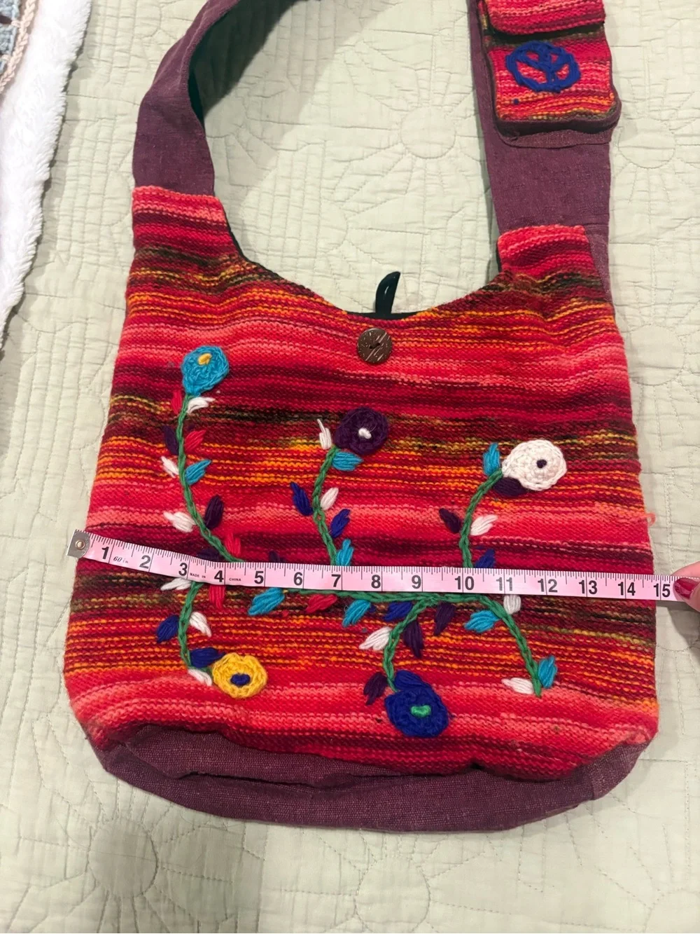 Handcrafted Colorful Hobo Bag with Embroidered Floral Detail Made in Nepal